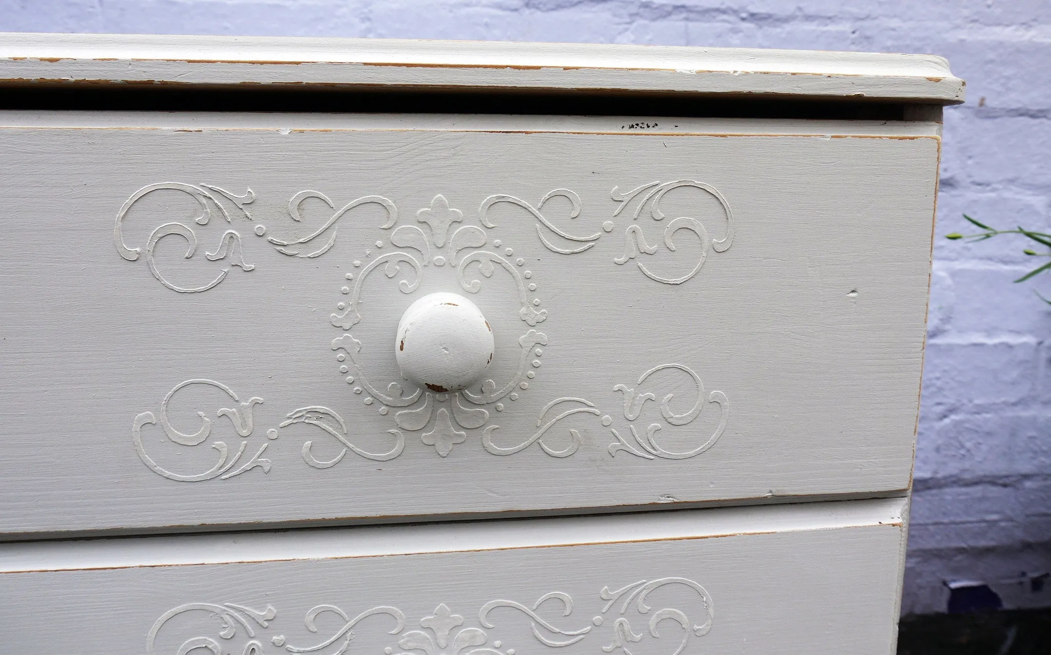 Vintage tall bedside cabinet with embossed stencil design